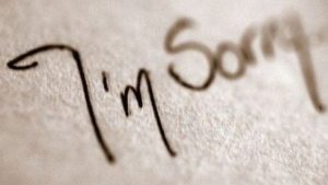 Un foglio con scritto I'm Sorry 